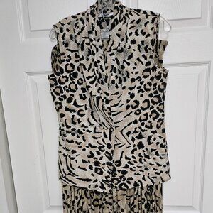 E.K DESIGNS. Vintage. 1990's. Sleeveless top. Pleated skirt.  Animal Print.
